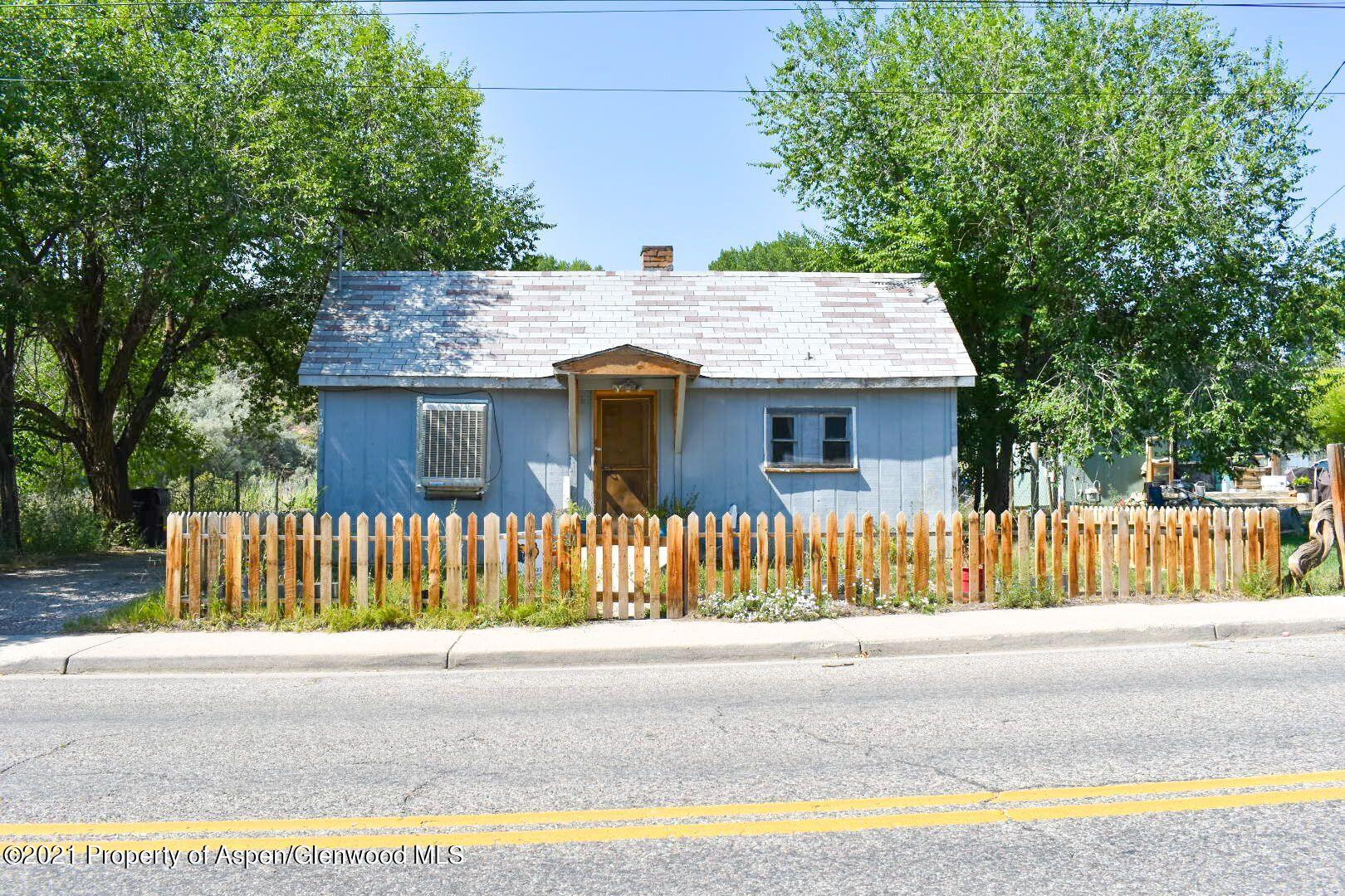 729 Park Avenue Rifle, CO 81650 - Photo 1 of 4 a front view of a house