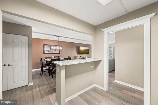 a kitchen with a stove and a microwave