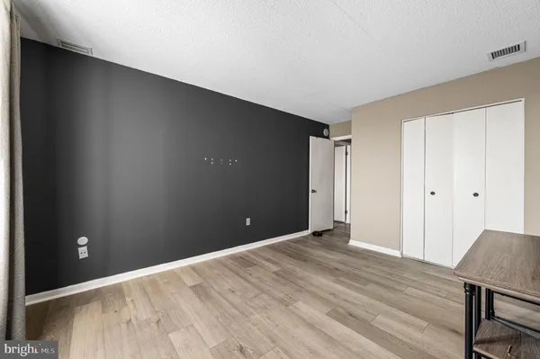 a en suite bathroom with a sink and a mirror