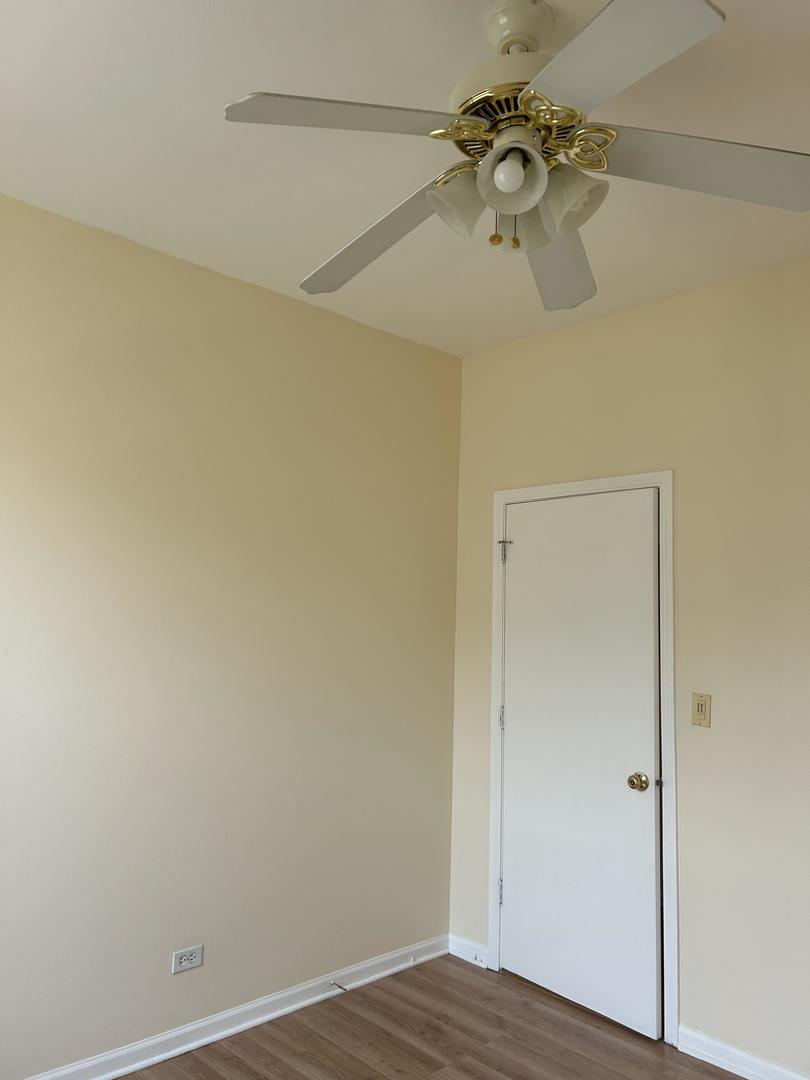 800 South Independence Boulevard, Unit 3 Chicago, IL 60624 - Photo 4 of 12 a view of a room with wooden floor