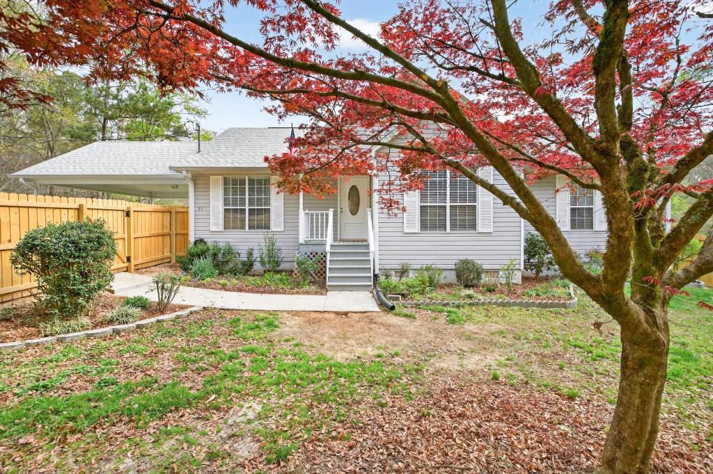 335 Ranger Way Braselton, GA 30517 - Photo 1 of 63 front view of a house with a yard