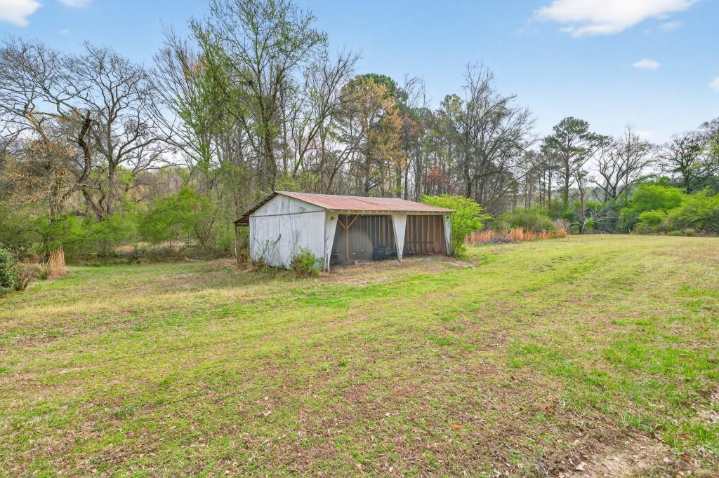 335 Ranger Way Braselton, GA 30517 - Photo 38 of 63 a house view with a garden space