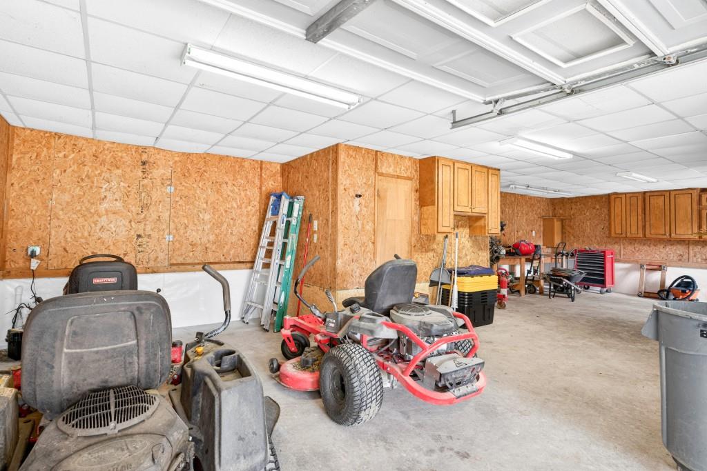 335 Ranger Way Braselton, GA 30517 - Photo 44 of 63 a room with furniture and a large window