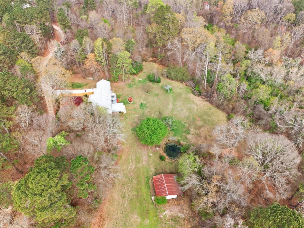 335 Ranger Way Braselton, GA 30517 - Photo 55 of 63 a backyard of a house with a yard and outdoor seating