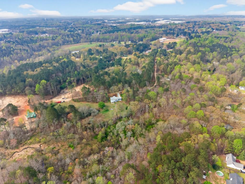 335 Ranger Way Braselton, GA 30517 - Photo 59 of 63 an aerial view of town with residential space and mountain view in back