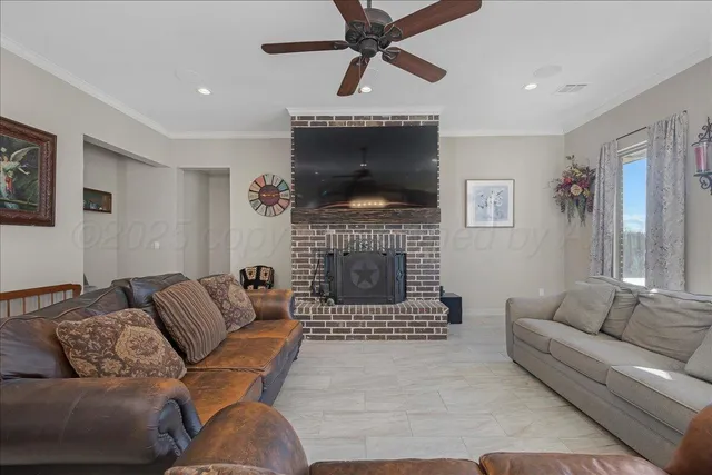 a bathroom with a granite countertop toilet sink and mirror