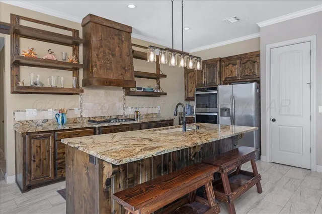 a bedroom with furniture and a flat screen tv