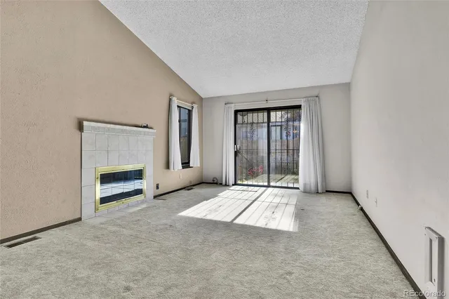 a view of a livingroom with a fireplace