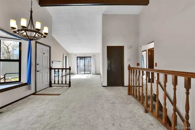 a kitchen with a cabinets a sink and a stove top oven
