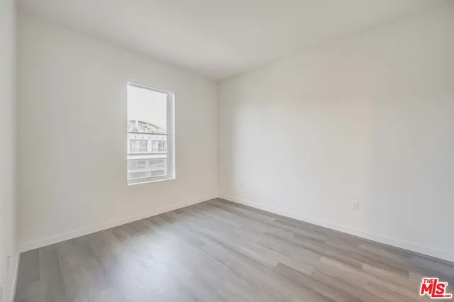a bathroom with a bathtub shower sink vanity and toilet