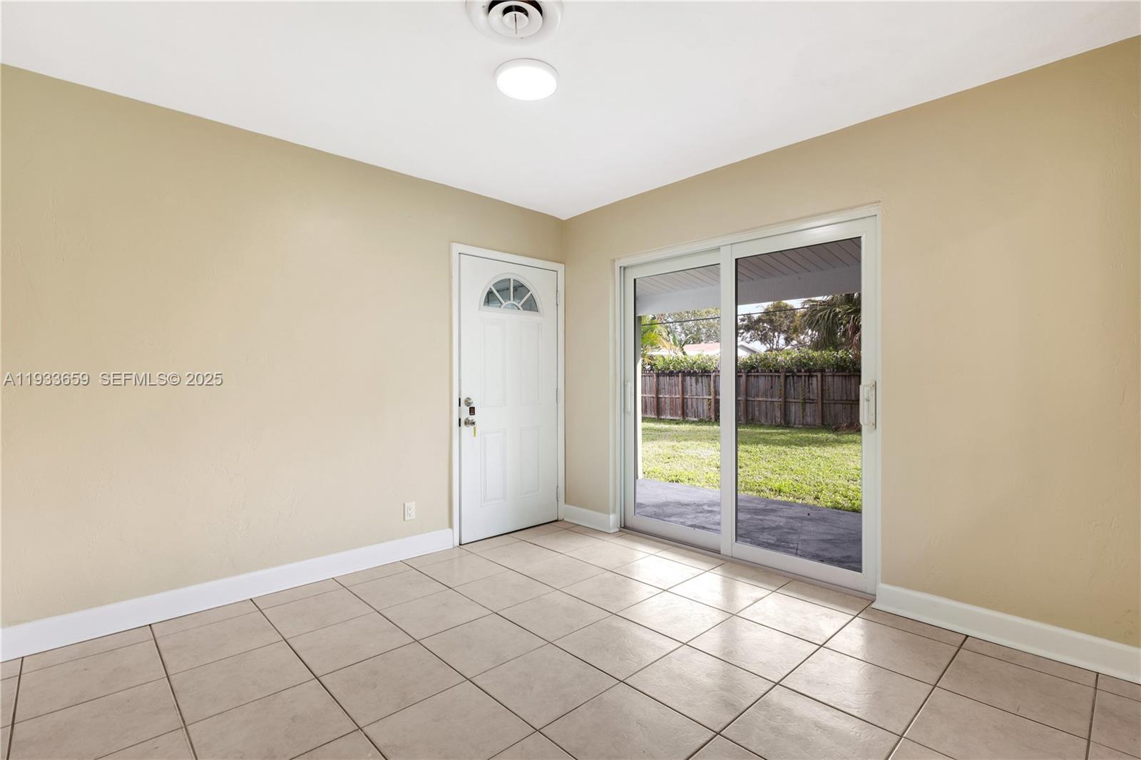 142 Southwest 53rd Avenue Plantation, FL 33317 - Photo 14 of 30 a view of an empty room and window