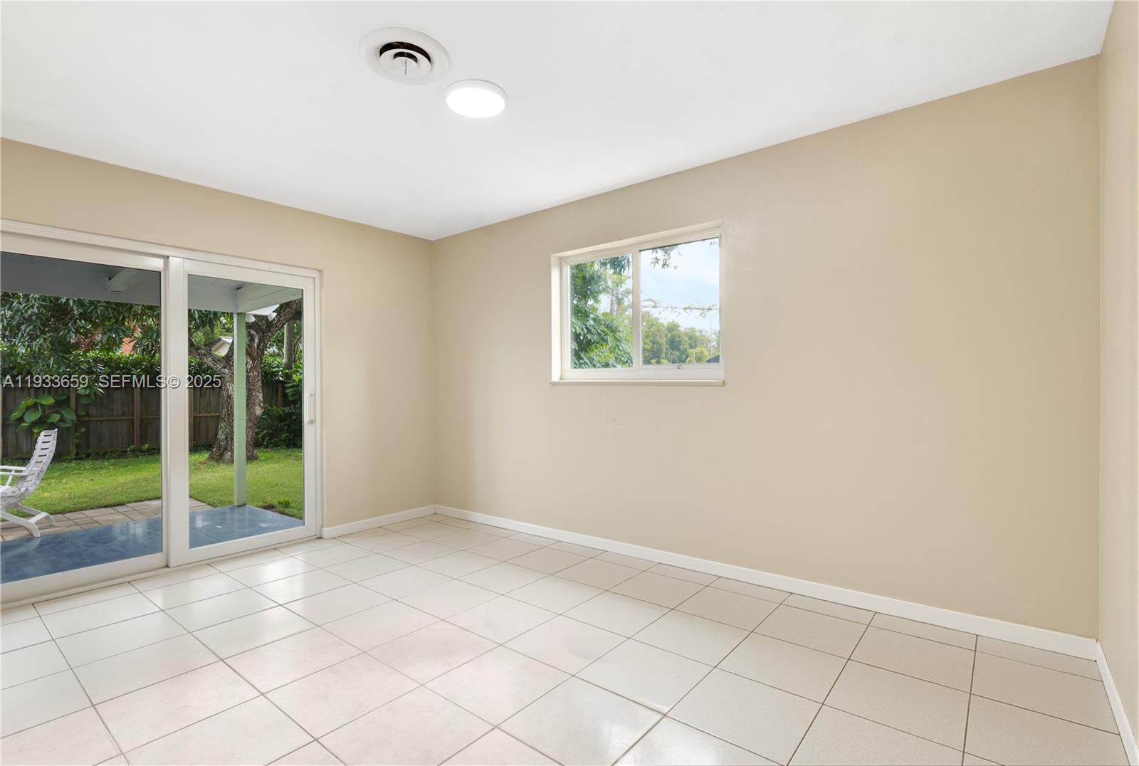 142 Southwest 53rd Avenue Plantation, FL 33317 - Photo 16 of 30 a view of an empty room with a window
