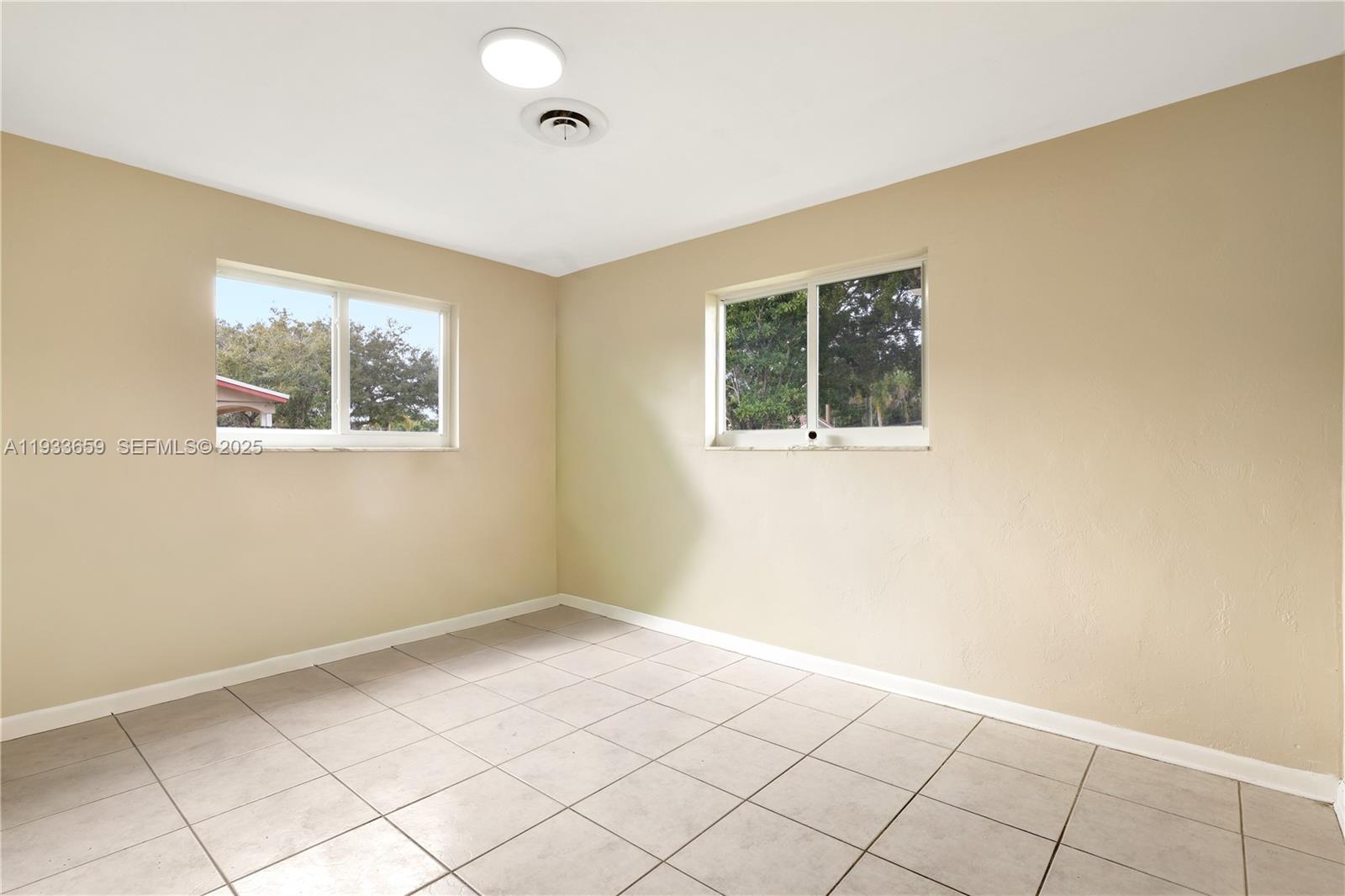 142 Southwest 53rd Avenue Plantation, FL 33317 - Photo 18 of 30 a view of an empty room with a window
