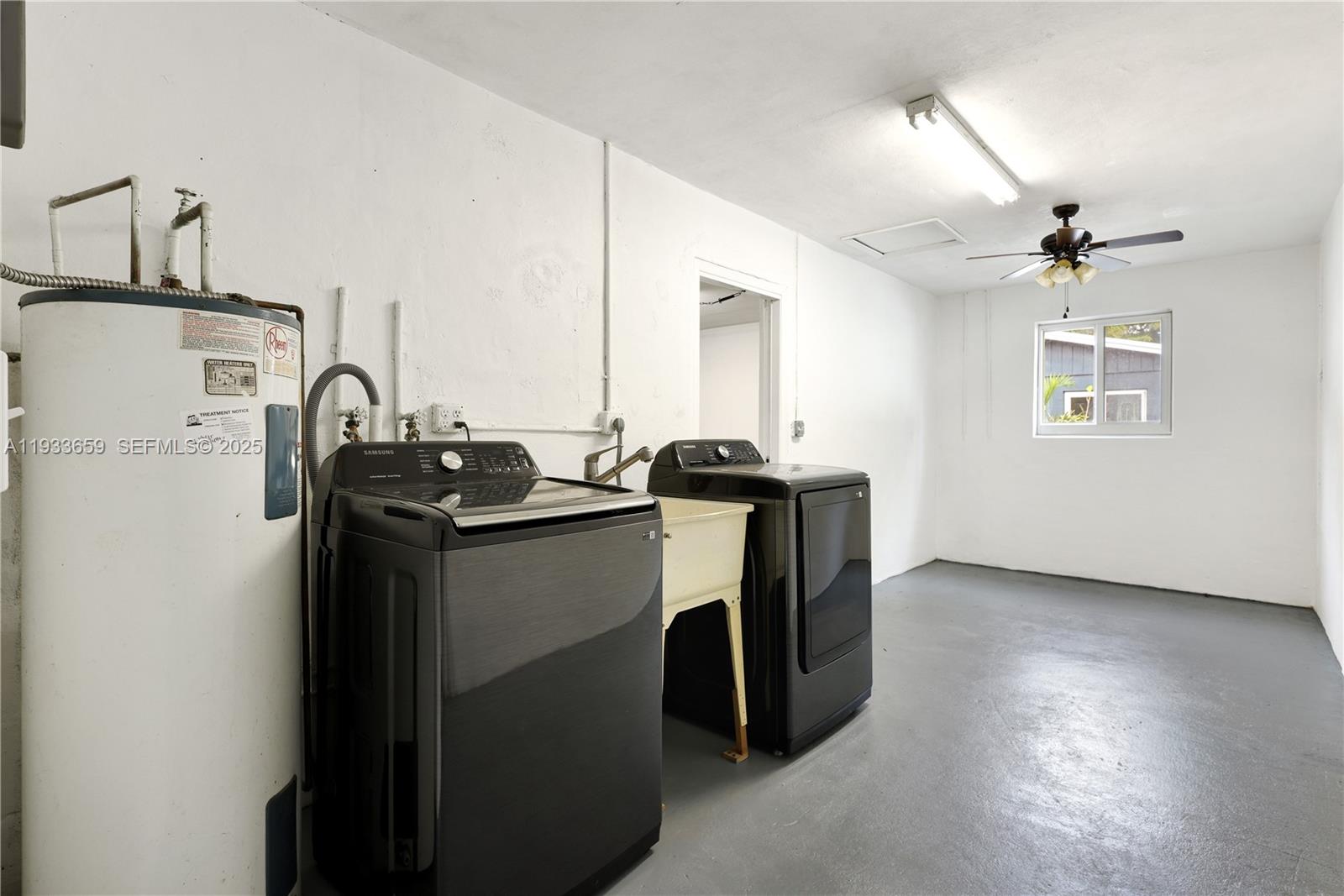 142 Southwest 53rd Avenue Plantation, FL 33317 - Photo 22 of 30 a utility room with dryer and washer