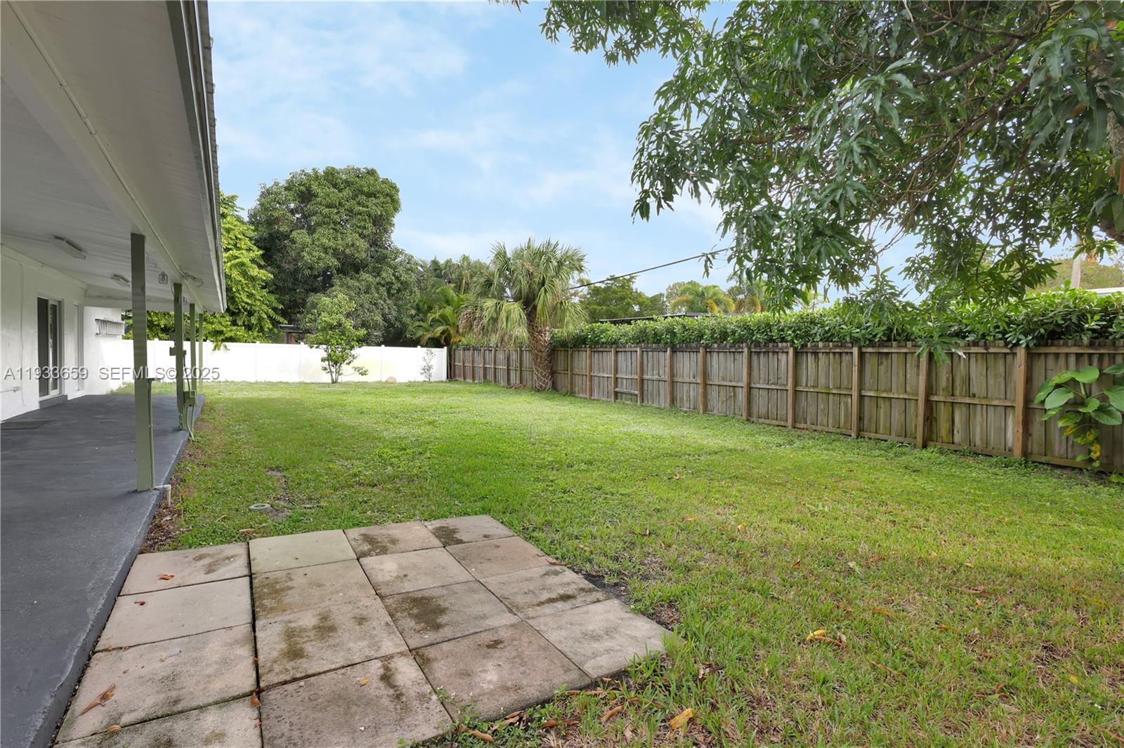 142 Southwest 53rd Avenue Plantation, FL 33317 - Photo 28 of 30 a view of a backyard with a garden