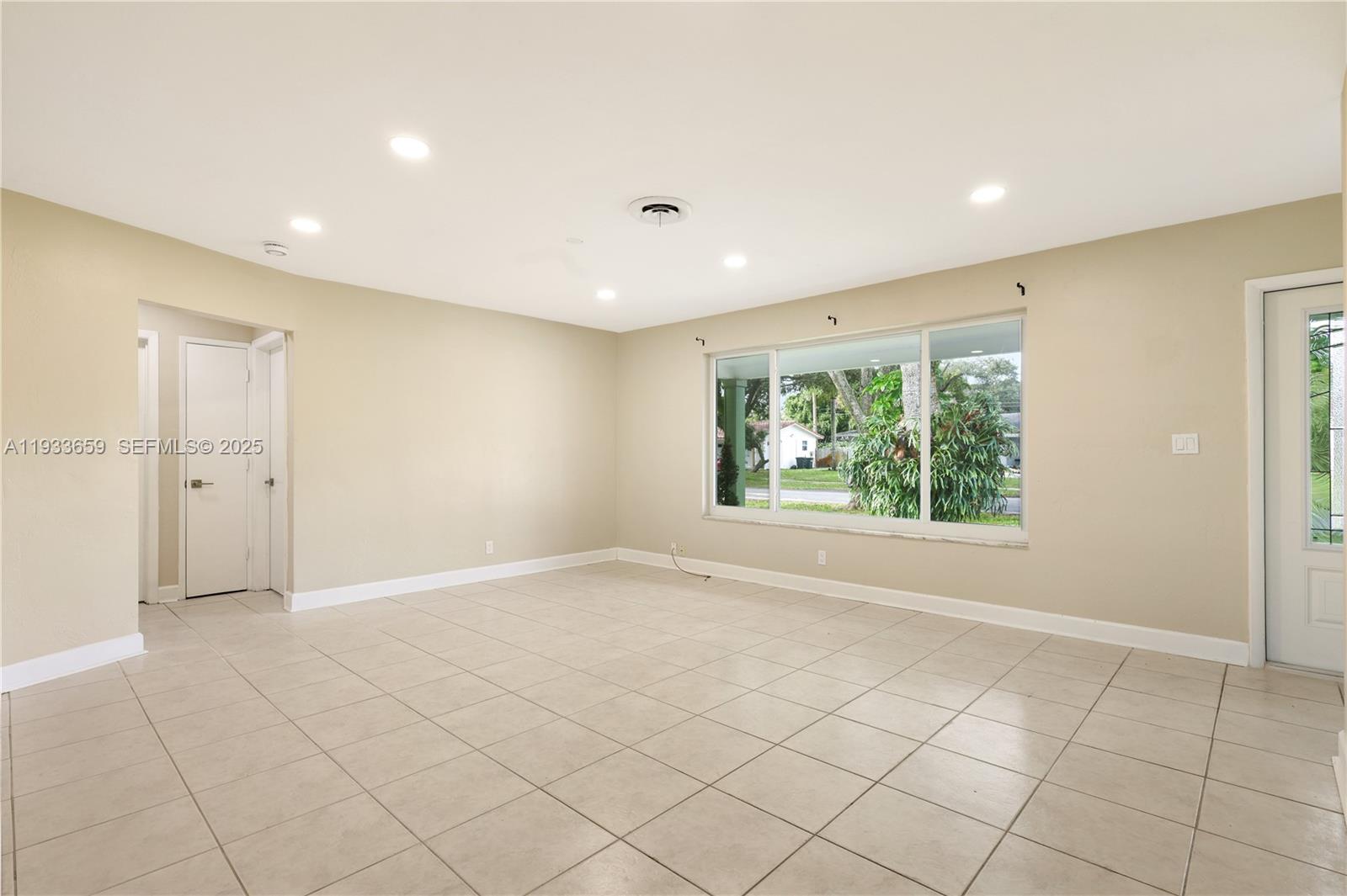 142 Southwest 53rd Avenue Plantation, FL 33317 - Photo 7 of 30 a view of an empty room with a window