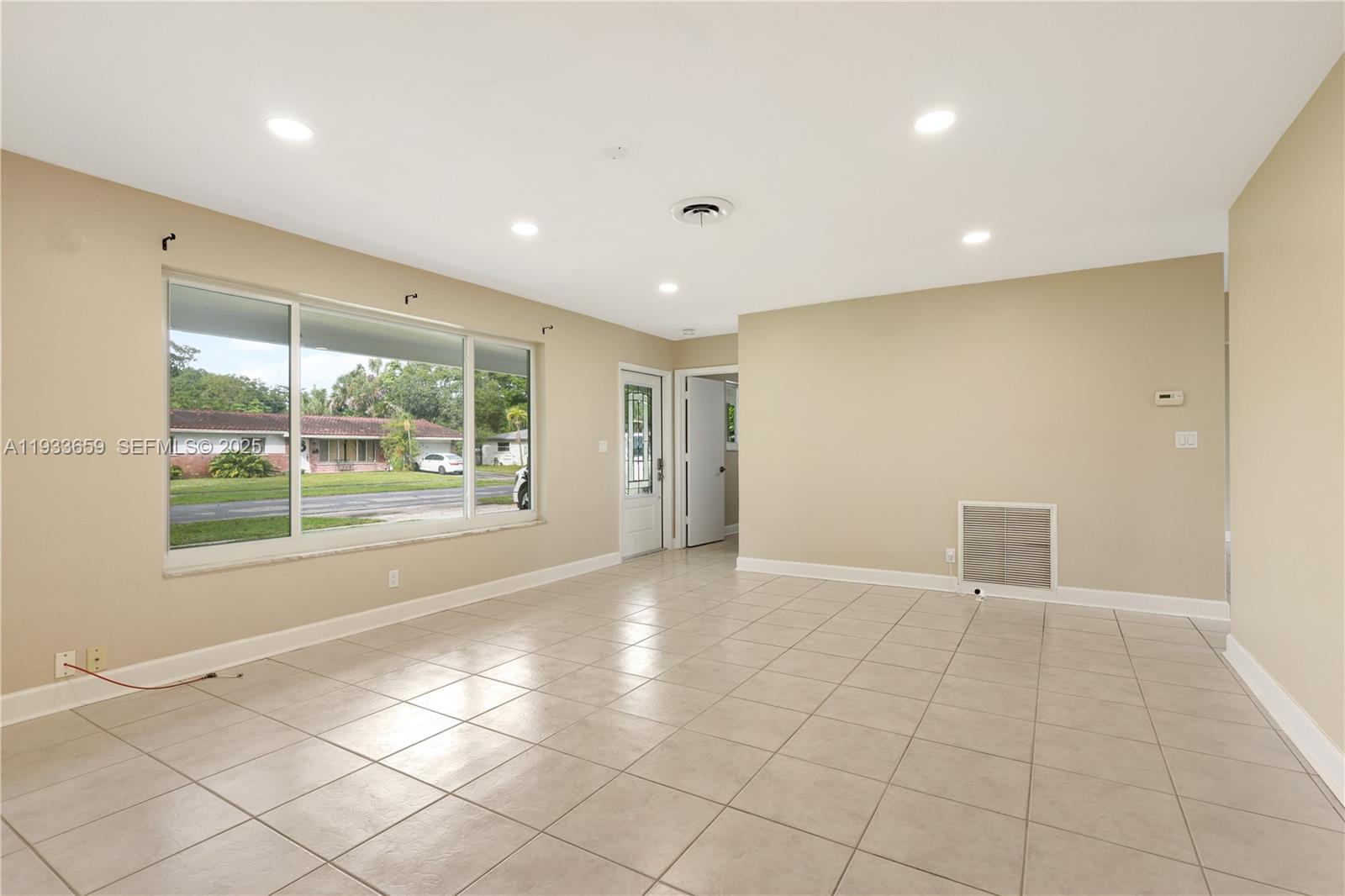 142 Southwest 53rd Avenue Plantation, FL 33317 - Photo 9 of 30 a view of an empty room with a window