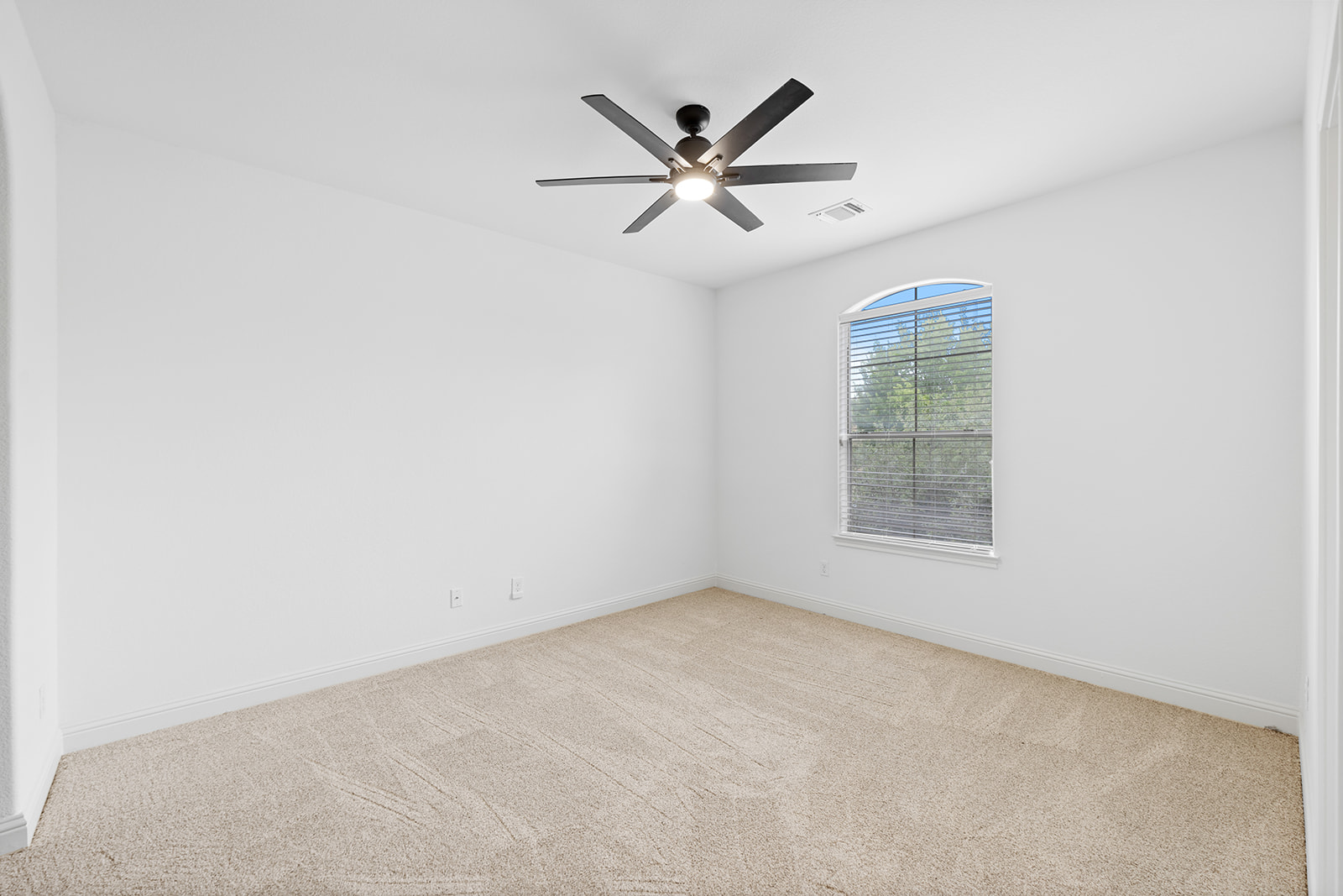 114 North Saddle Ridge Drive Cedar Park, TX 78613 - Photo 28 of 40 an empty room with a ceiling fan and window