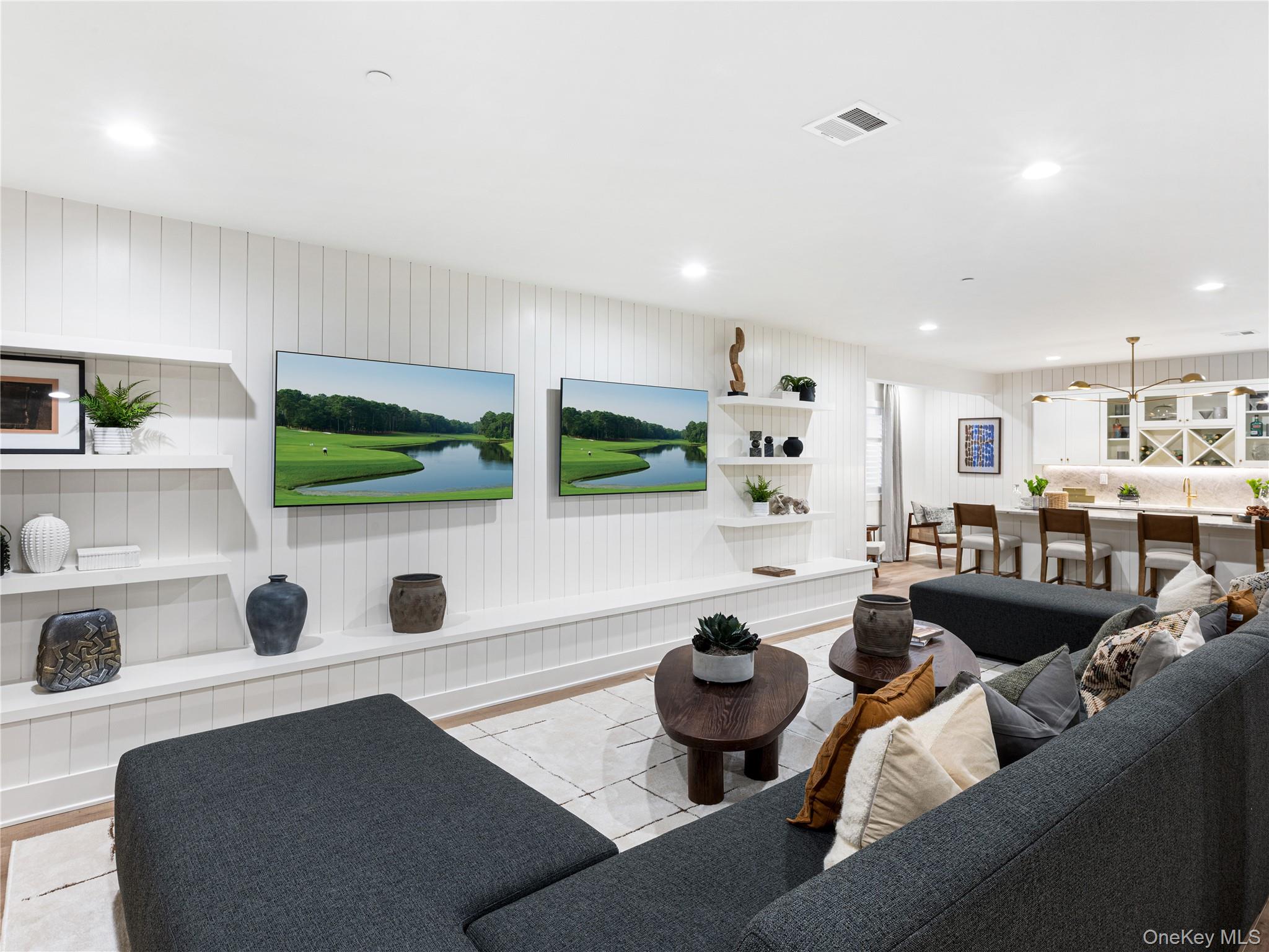 2027 Summit Loop, Unit 87 Carmel, NY 10512 - Photo 5 of 20 a living room with furniture and a flat screen tv