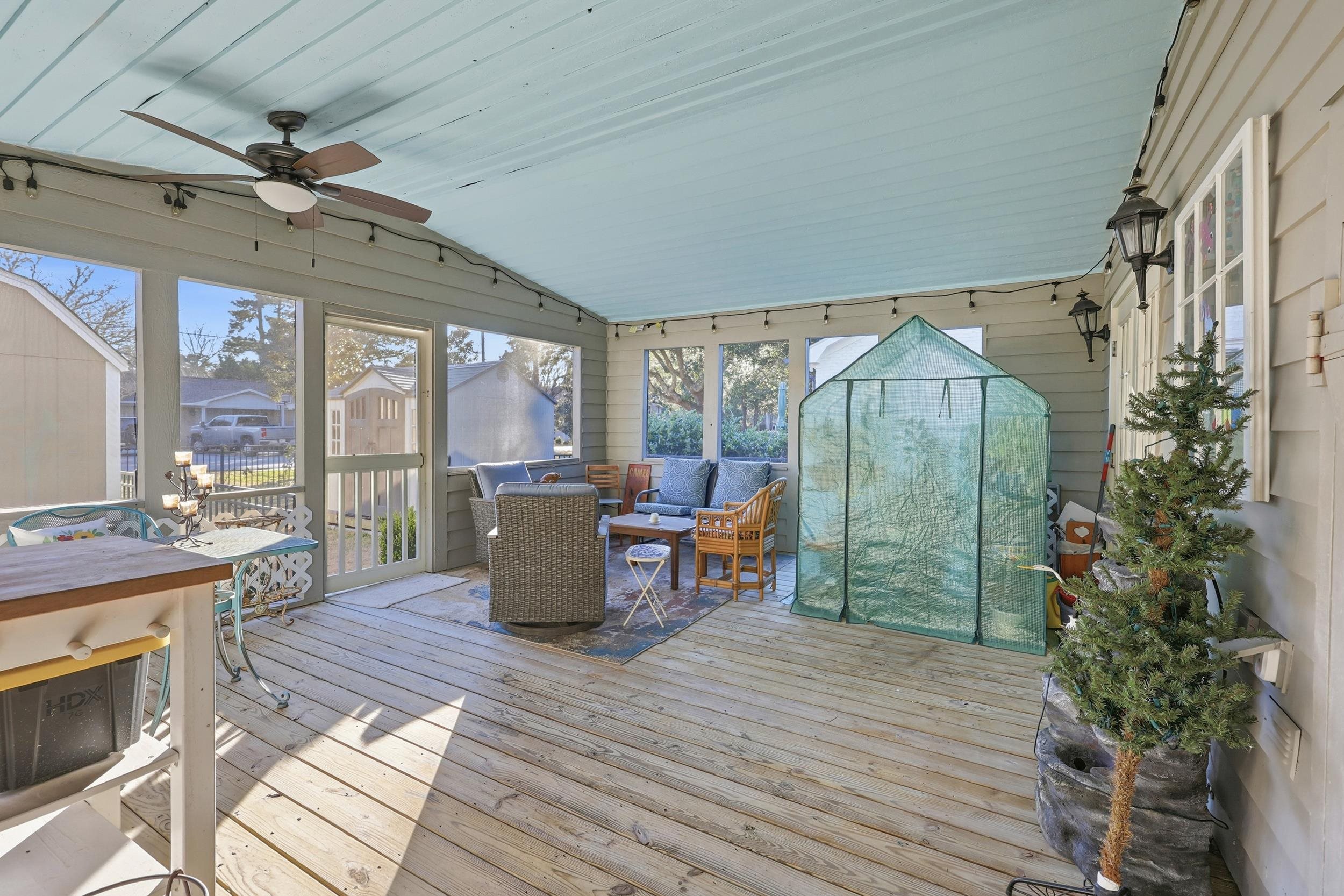 709 Mt Gilead Road Murrells Inlet, SC 29576 - Photo 28 of 38 Sunroom with a ceiling fan, lofted ceiling, outdoor lounge area, and a deck