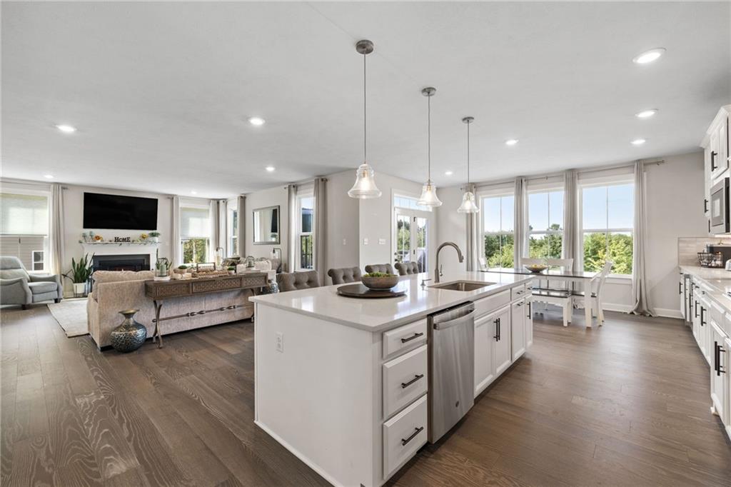 313 Crest Lane Mars, PA 16046 - Photo 14 of 50 a large kitchen with stainless steel appliances lots of counter space sink refrigerator and wooden floor