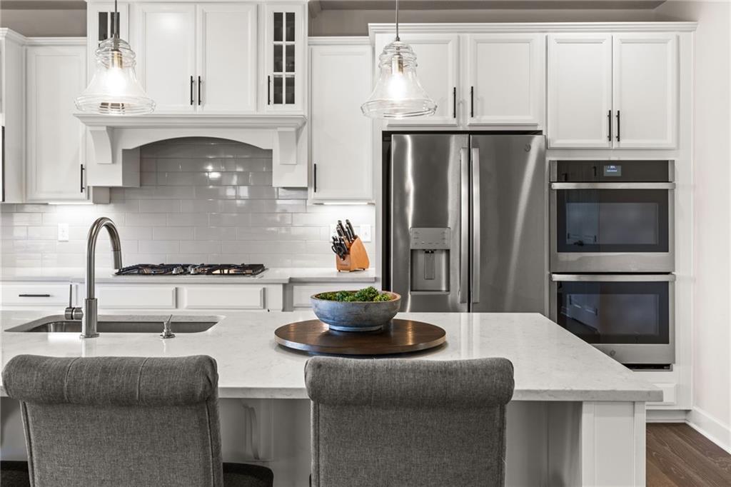 313 Crest Lane Mars, PA 16046 - Photo 20 of 50 a kitchen with stainless steel appliances a sink and a refrigerator