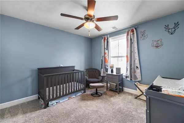 a view of a hallway with washer and dryer