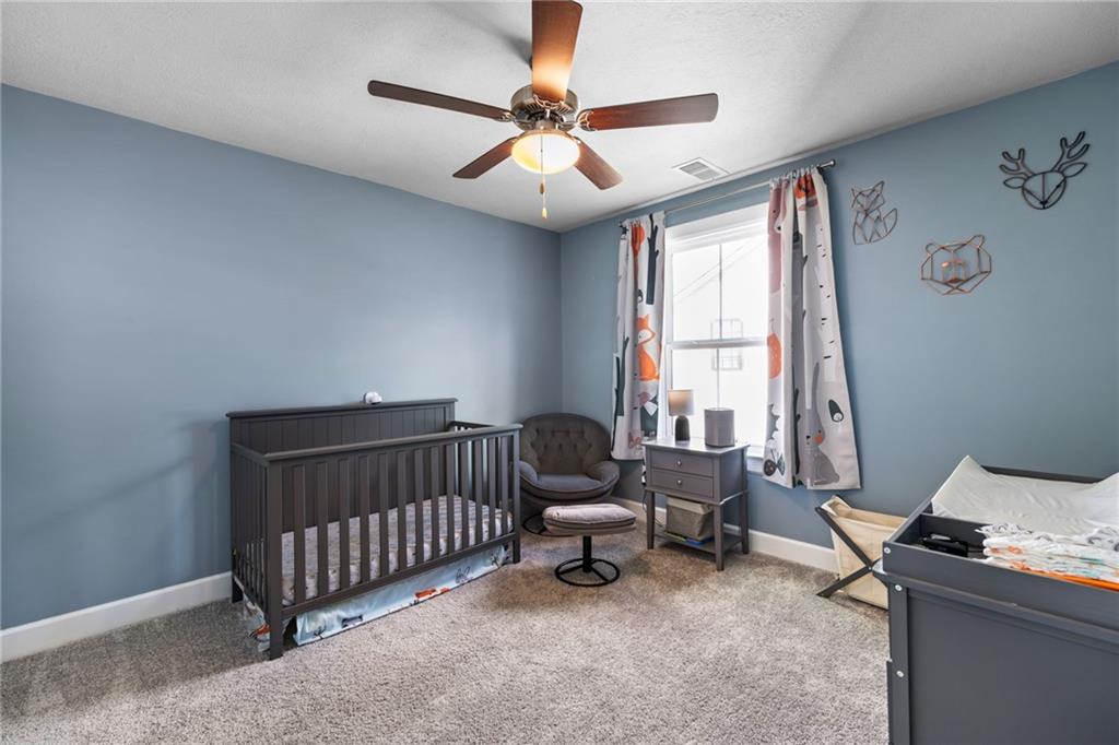 313 Crest Lane Mars, PA 16046 - Photo 29 of 50 a bedroom with a bed and a window