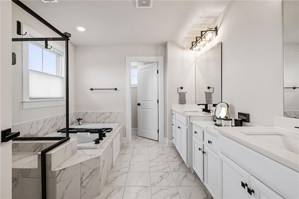 313 Crest Lane Mars, PA 16046 - Photo 34 of 50 a bathroom with a double vanity sink mirror and