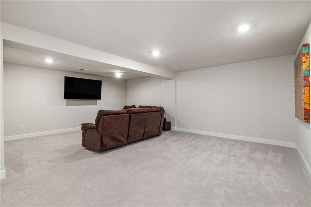 313 Crest Lane Mars, PA 16046 - Photo 38 of 50 a room with furniture and a flat screen tv