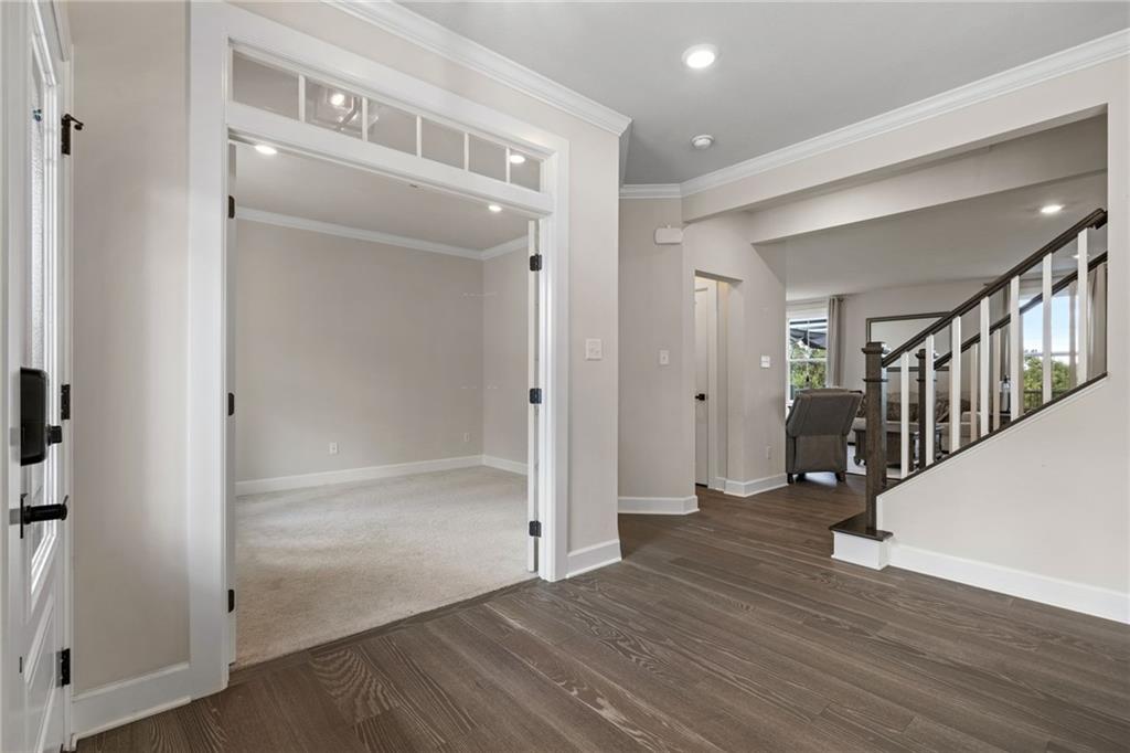 313 Crest Lane Mars, PA 16046 - Photo 7 of 50 a view of a hallway with wooden floor and entryway