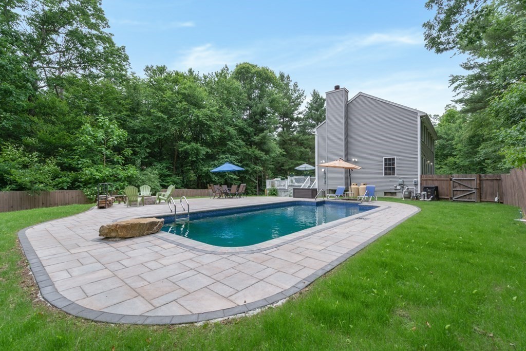 132 Fowler Road Northbridge, MA 01534 - Photo 3 of 42 a view of a swimming pool with a patio
