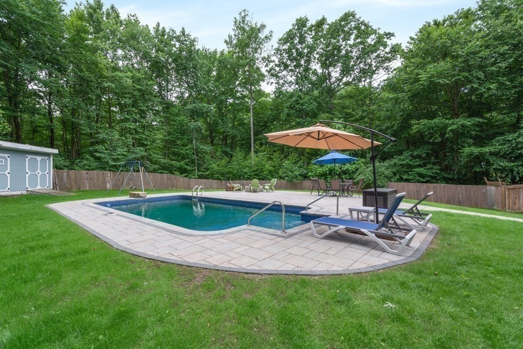 132 Fowler Road Northbridge, MA 01534 - Photo 41 of 42 a view of a backyard with sitting area