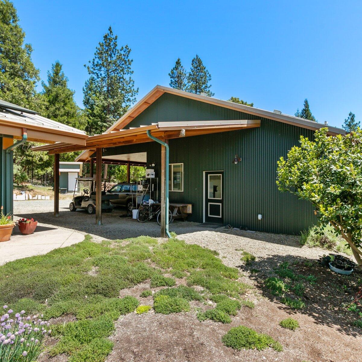 1104 Upper Cow Creek Road Azalea, OR 97410 - Photo 45 of 77 a view of a house with backyard porch and sitting area