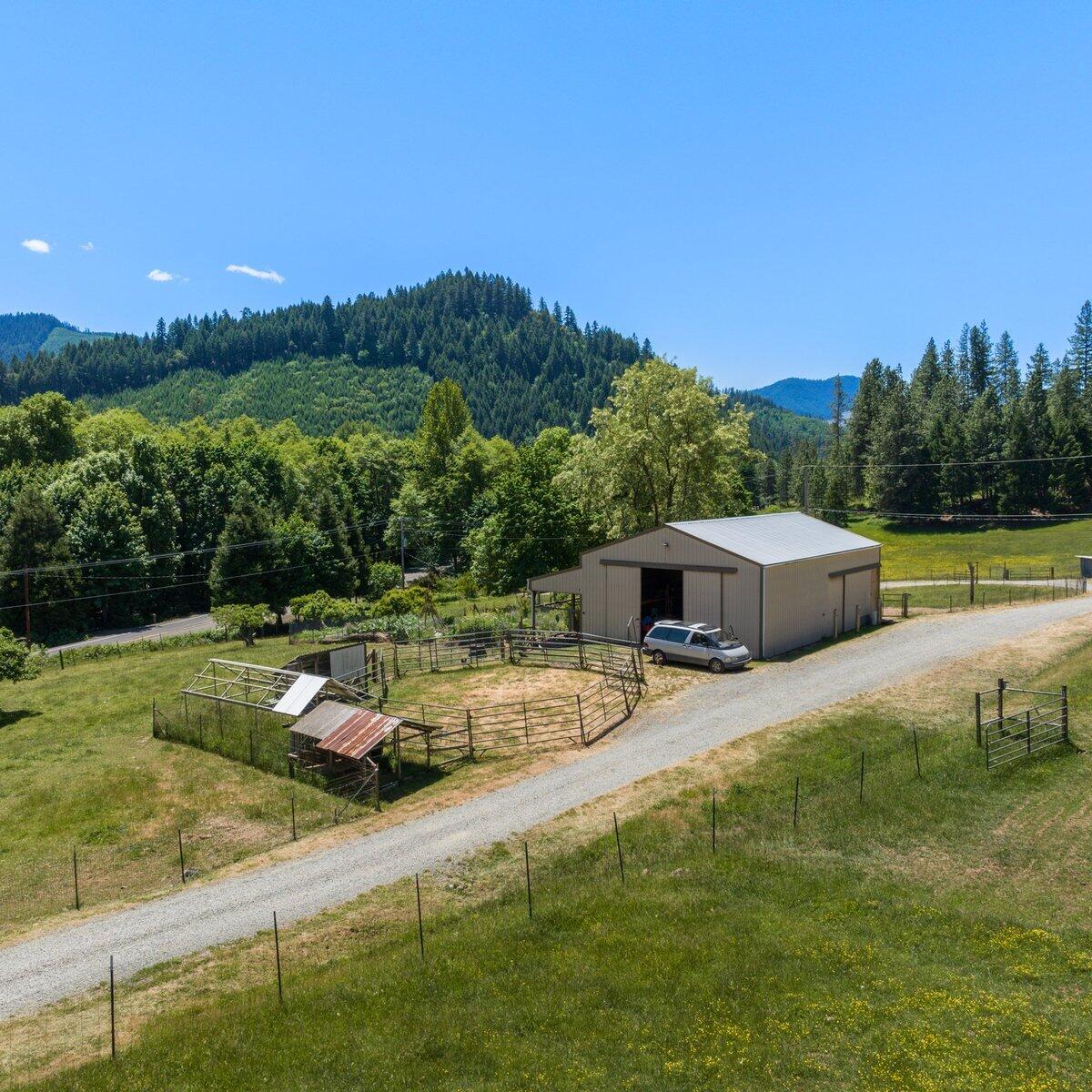 1104 Upper Cow Creek Road Azalea, OR 97410 - Photo 50 of 77 a view of a house with a yard