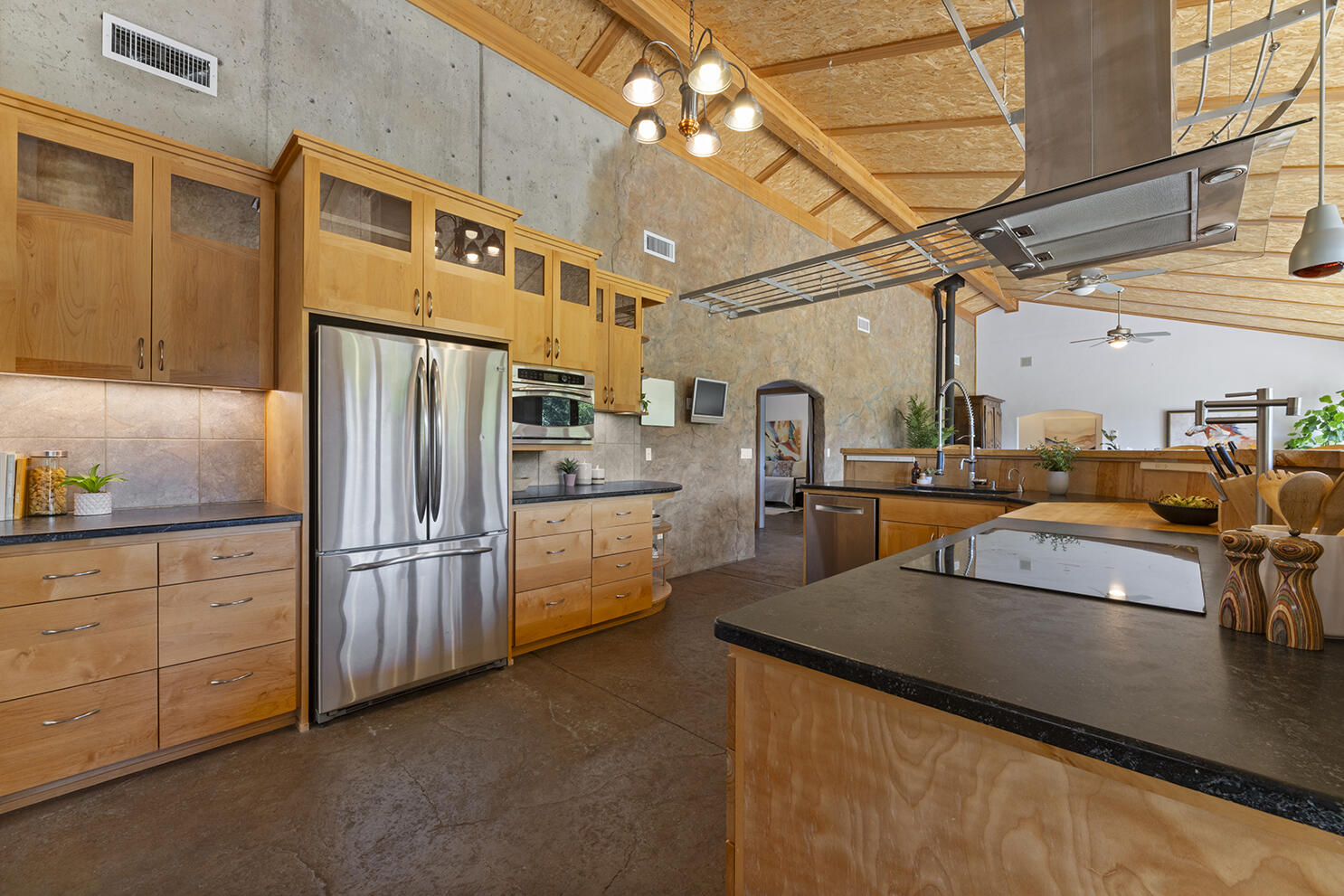 1104 Upper Cow Creek Road Azalea, OR 97410 - Photo 6 of 77 a kitchen with refrigerator and cabinets