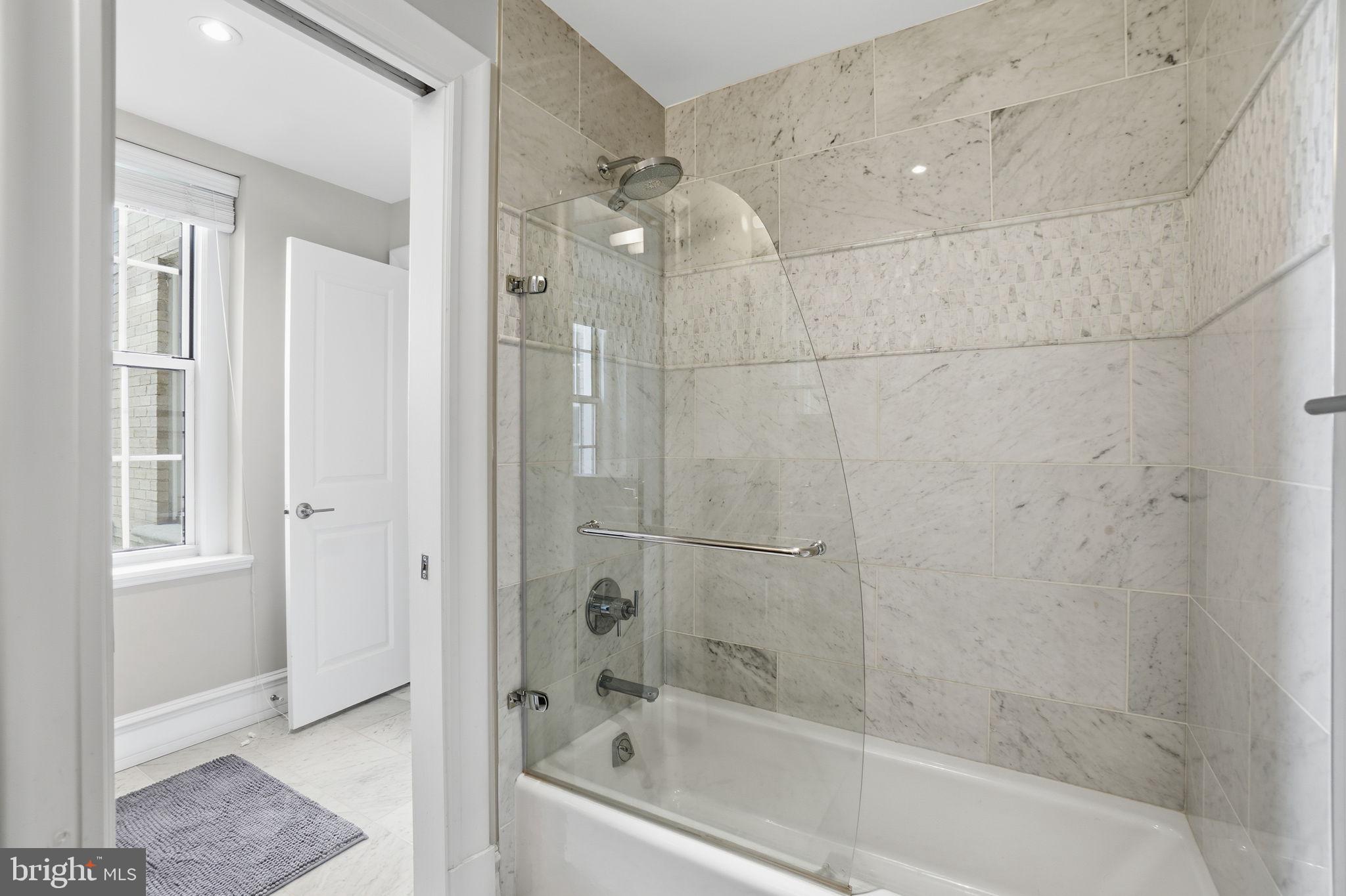 1801 16th Street Northwest, Unit 501 Washington, DC 20009 - Photo 13 of 27 Bathroom is set up with 2 entrances: shower area