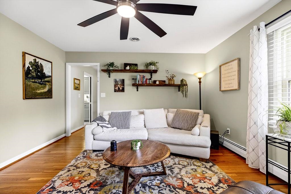 224 Meadowbrook Road Staunton, VA 24401 - Photo 13 of 59 a living room with furniture and wooden floor
