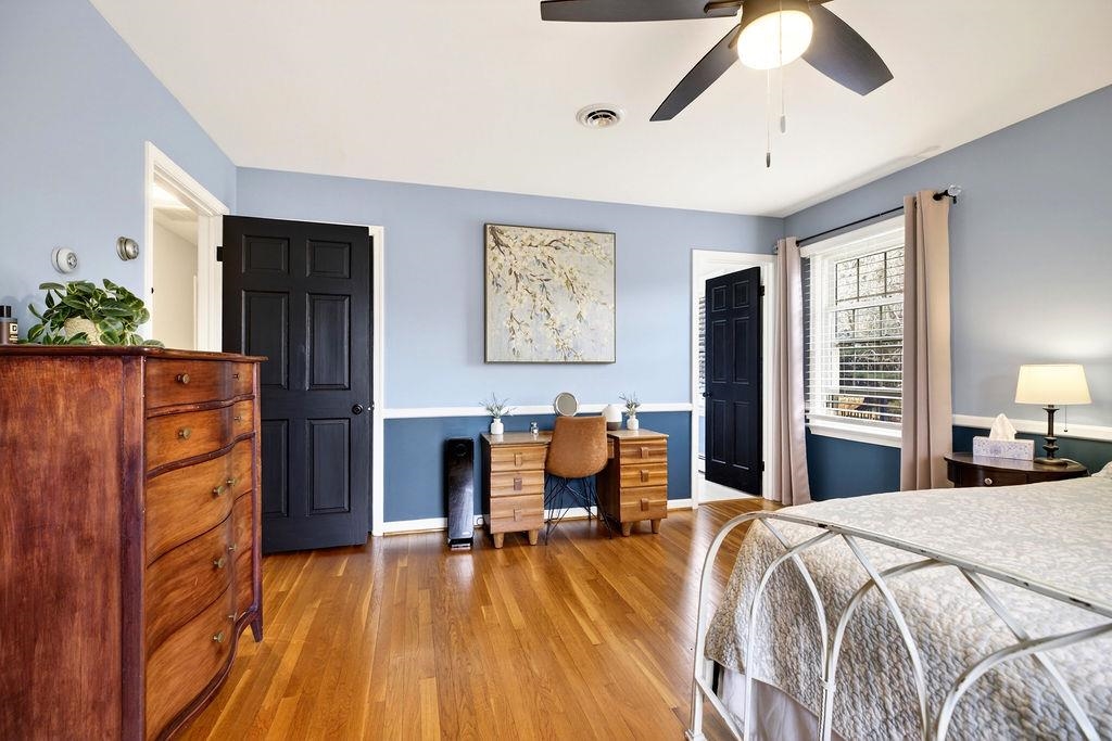 224 Meadowbrook Road Staunton, VA 24401 - Photo 16 of 59 a bedroom with a bed and wooden floor