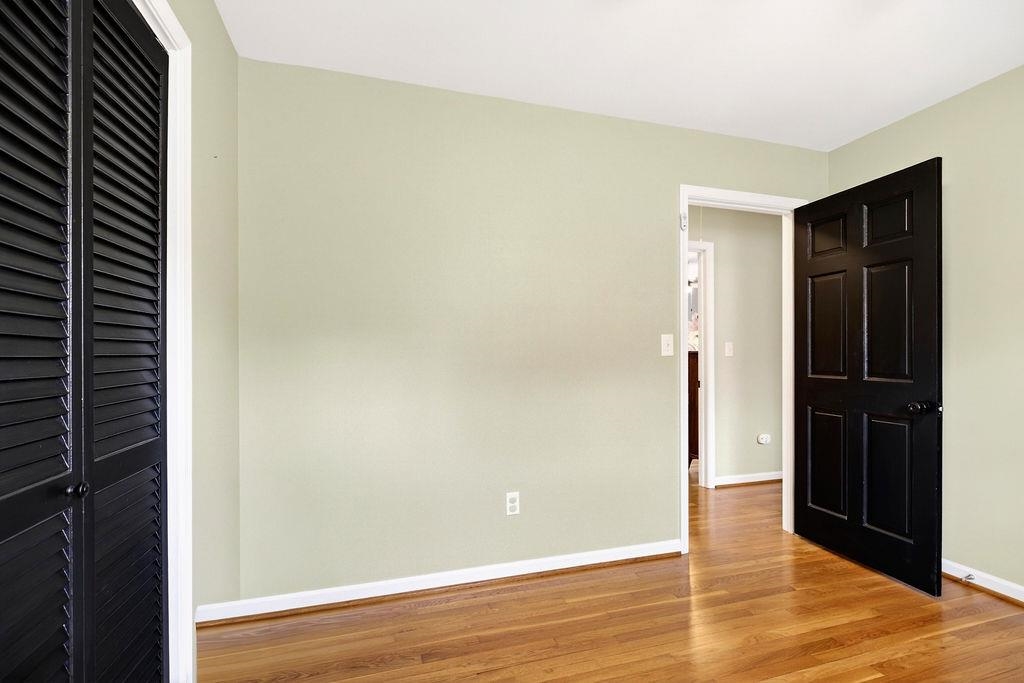 224 Meadowbrook Road Staunton, VA 24401 - Photo 22 of 59 a view of an empty room with wooden floor