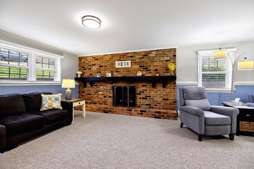 224 Meadowbrook Road Staunton, VA 24401 - Photo 28 of 59 a living room with furniture and a fireplace
