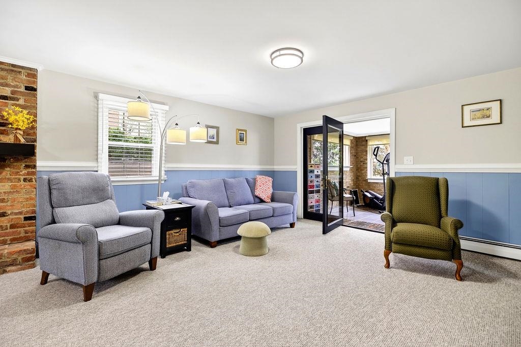 224 Meadowbrook Road Staunton, VA 24401 - Photo 32 of 59 a living room with furniture and a large window