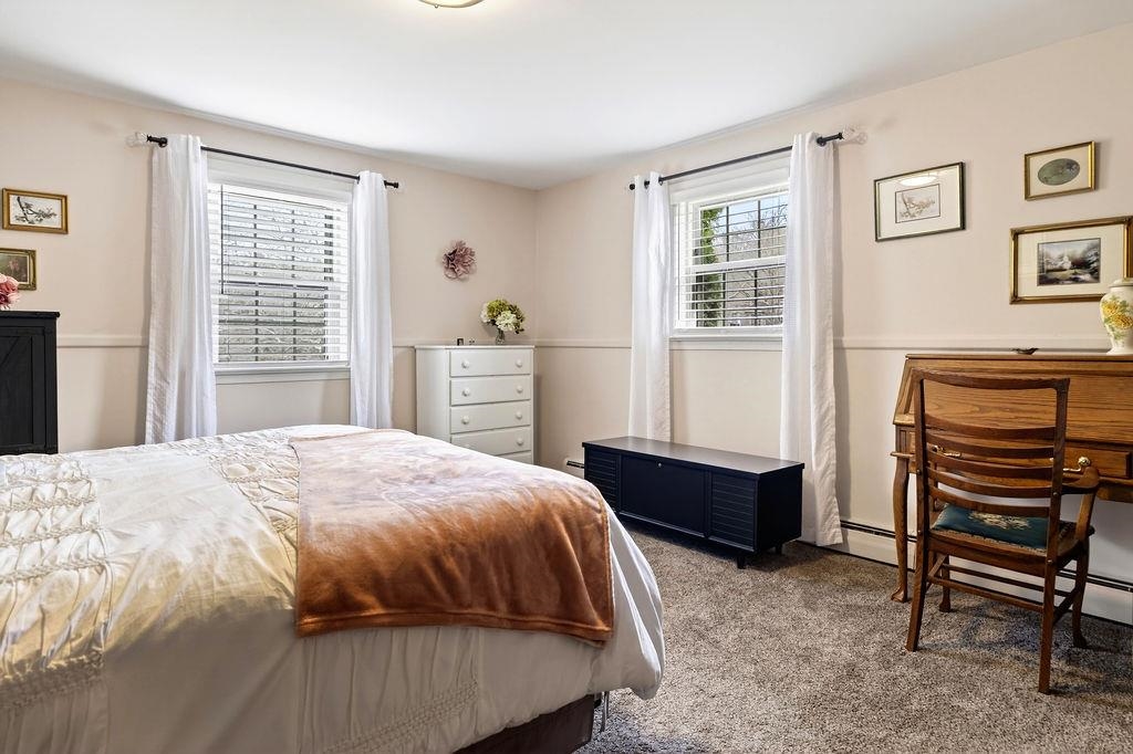 224 Meadowbrook Road Staunton, VA 24401 - Photo 35 of 59 a bedroom with a bed and a dresser next to a window