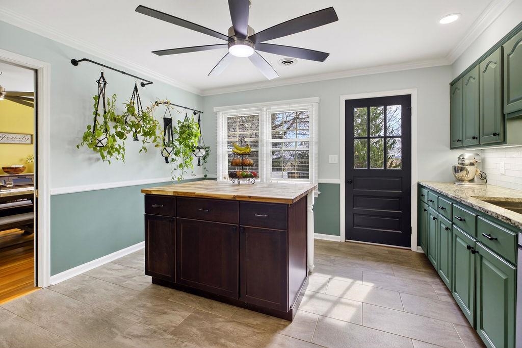224 Meadowbrook Road Staunton, VA 24401 - Photo 4 of 59 a kitchen with stainless steel appliances granite countertop a refrigerator and a sink