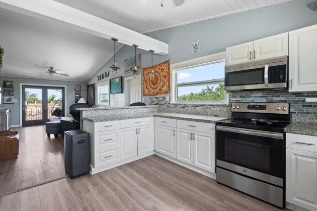 a room with window and wooden floor
