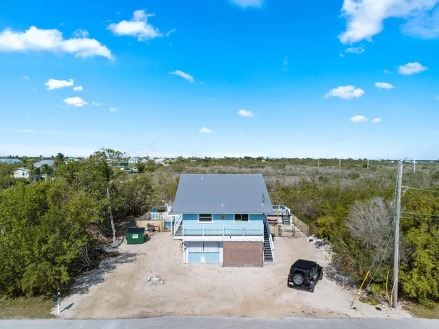 a view of a terrace with a garden