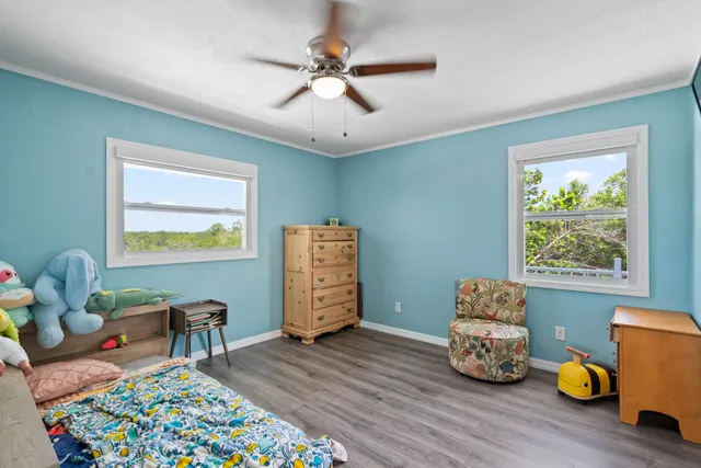 a view of balcony with outdoor seating and lake view