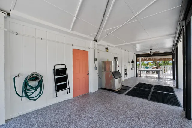 a bathroom with a shower and a sink