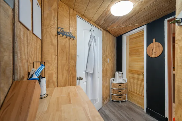 a bathroom with a glass shower door
