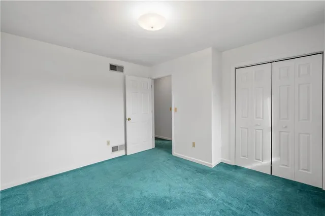 an empty room with closet